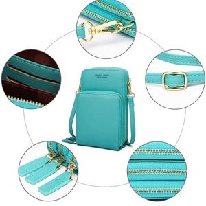 Teal cross body bag with gold details.